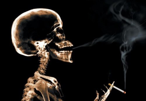 Image of skeleton in an x-ray smoking a cigarette