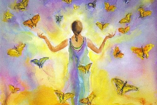 Woman releasing butterflies