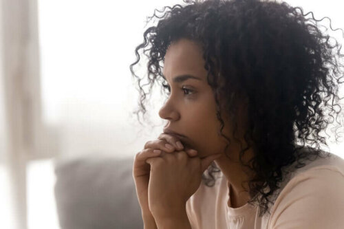 A woman in a bad mood due to negative energy.