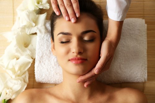 Woman getting a face massage