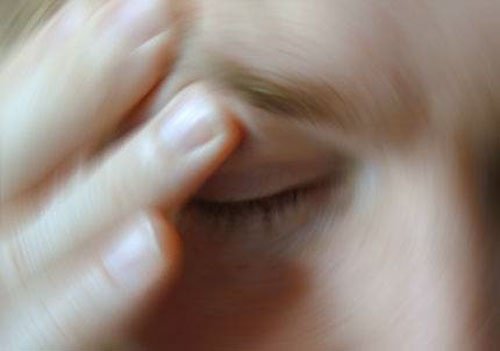 A person with a migraine.
