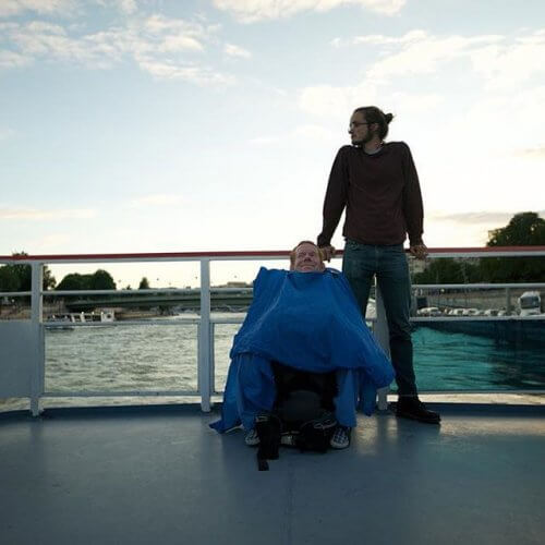 Kevan on a boat with one of his friends