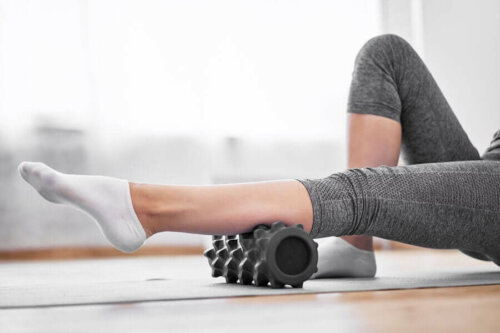 A person massaging their leg.