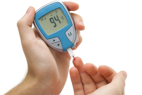 A person with hyperglycemia checking their blood sugar level.