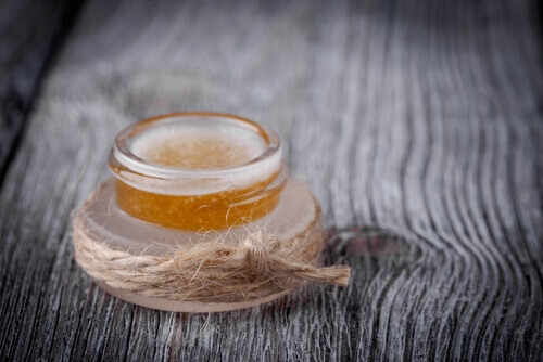 Small vial with honey and twine