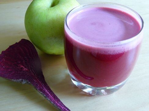 A glass of apple and beetroot smoothie