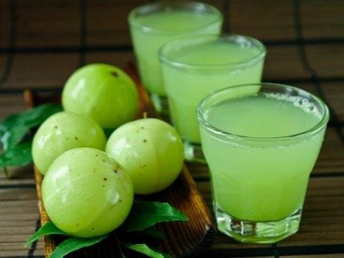 Glasses of Indian gooseberry juice.