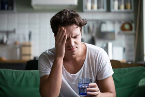 A man with a headache.
