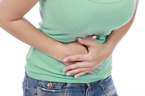 Woman with stomach pain
