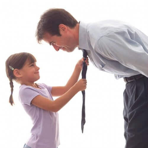 Daughter fixing father's tie strong woman
