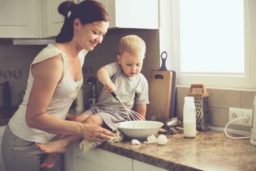mother and baby cooking together