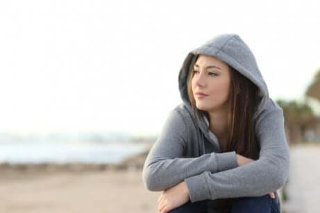 A woman distancing herself from complainers.
