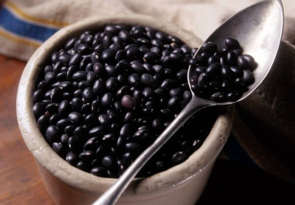 A bowl of black beans.
