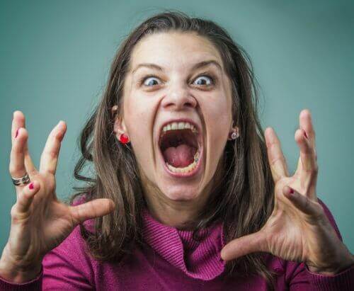 Woman venting her anger screaming at children