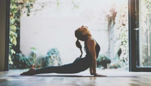 A woman doing yoga.