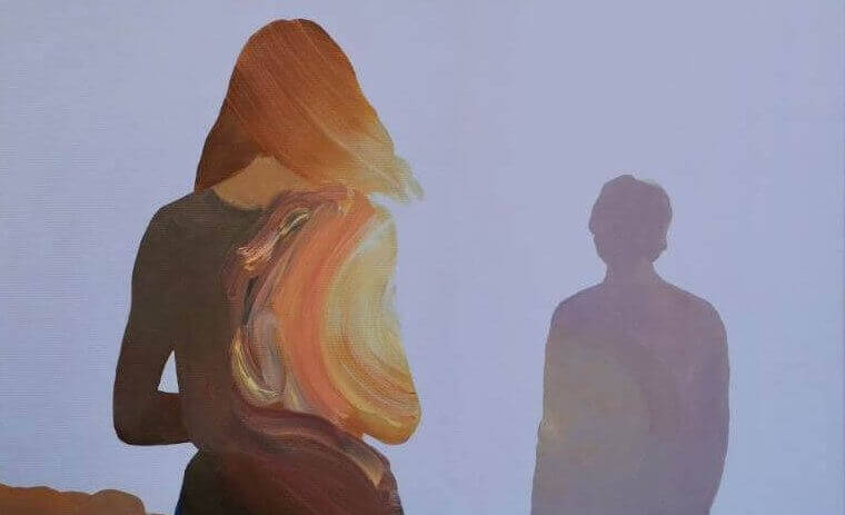 The shadows of a woman and a man.