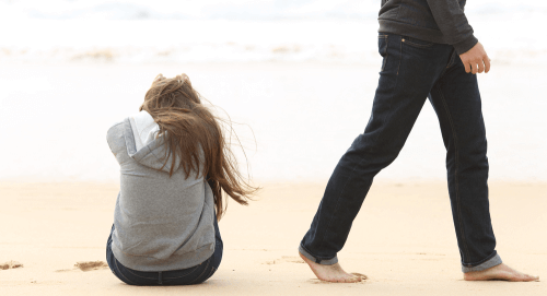 woman and man on a beach