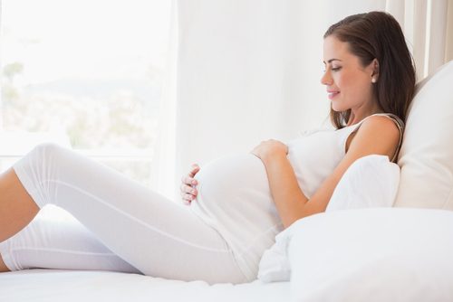 pregnant woman wearing white