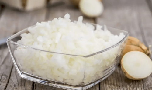 A bowl of chopped onion for treatments.