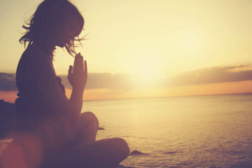 A person meditating.