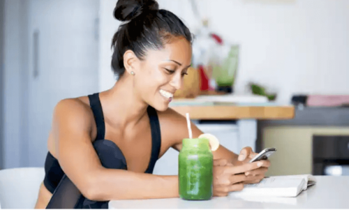A woman looking at her cellphone.