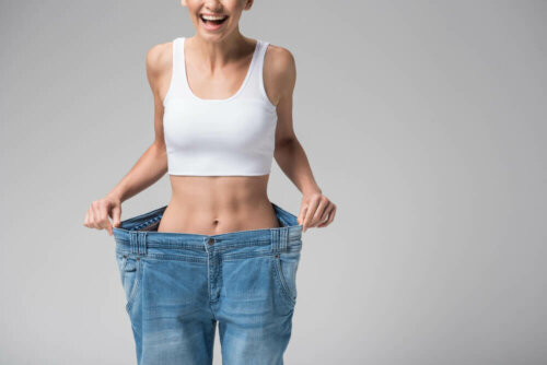 A woman with pants that don't fit.
