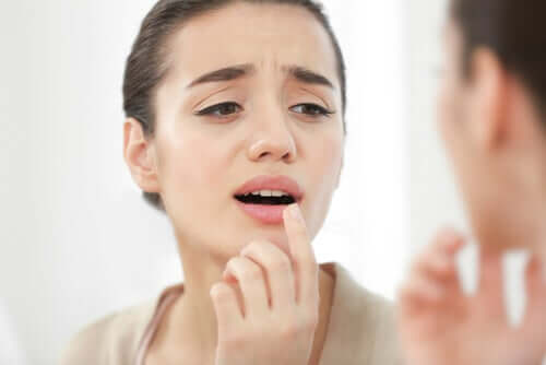 A woman worried she has tongue cancer.