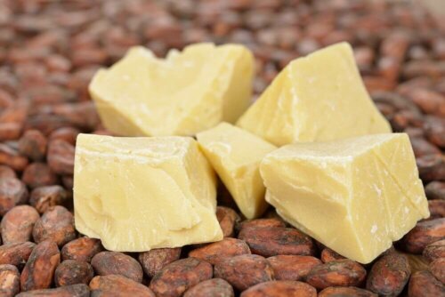 Some cocoa butter on top of some beans.