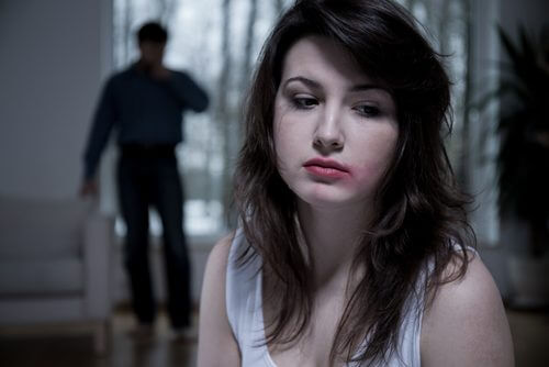 A woman in an abusive relationship.