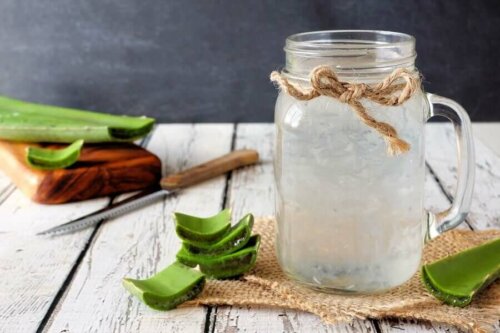aloe vera juice on a table in a mason jar