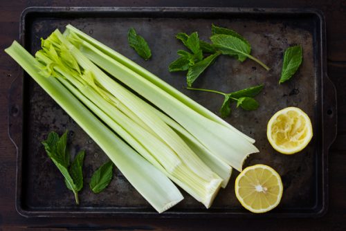 celery and lemon on a baking sheet for the celery diet