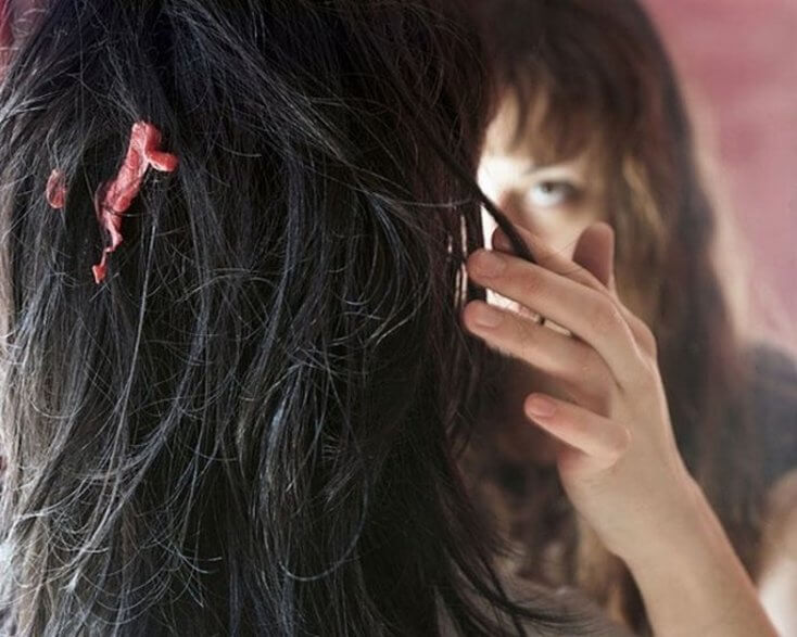 Girl with gum in her hair