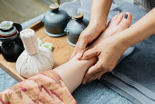 woman's leg massage at a spa for joint pain relief