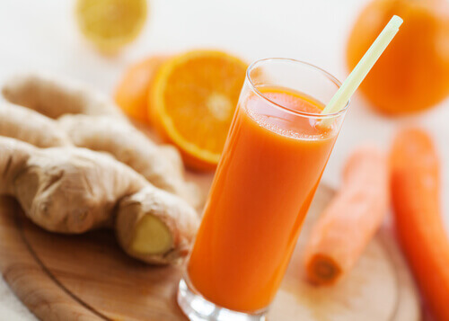 Ginger and carrot juice in a glass.