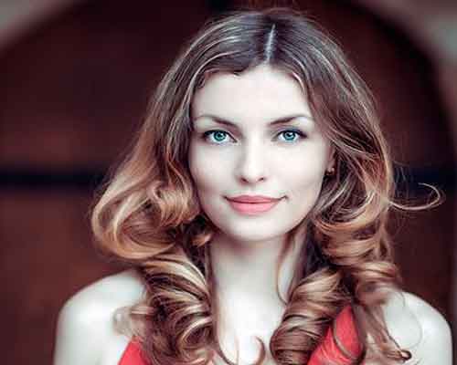 medium long length hair for oval shaped face to look younger