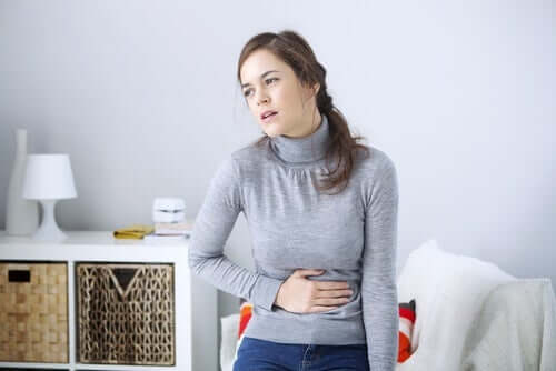 A woman with a stomachache.