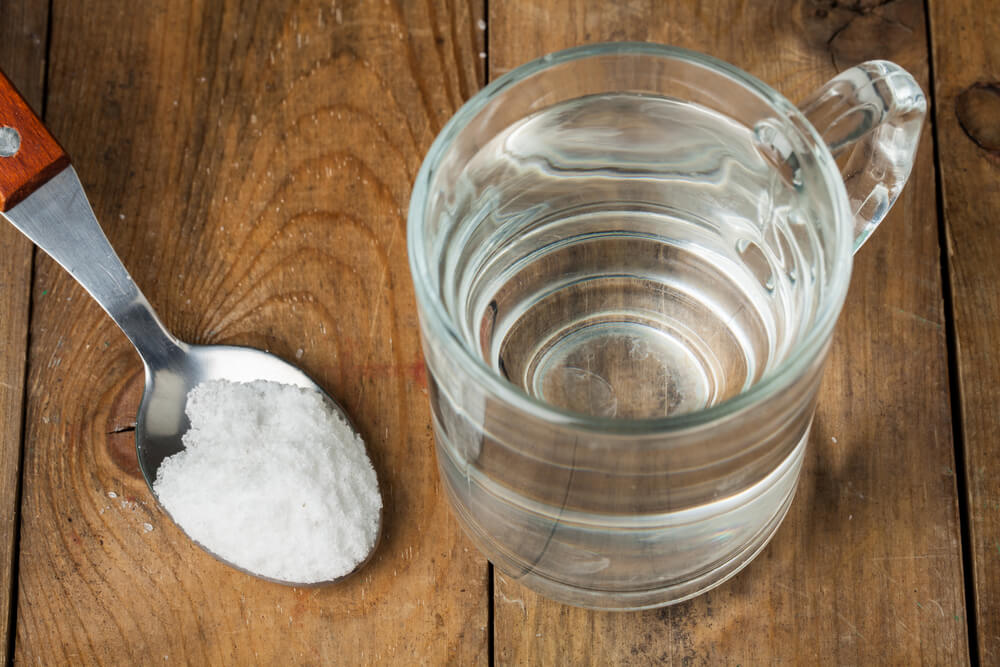Salt on a spoon and glass mug of water to clear your sinuses.