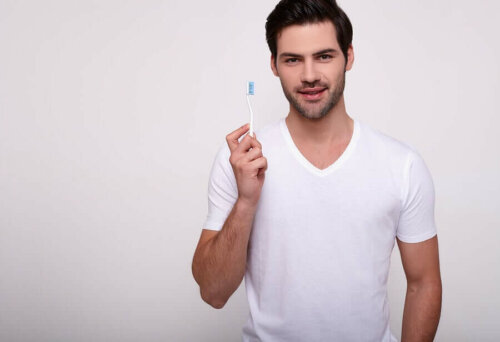 A man with a toothbrush.