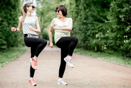 Two women dancing in order to get stronger feet.