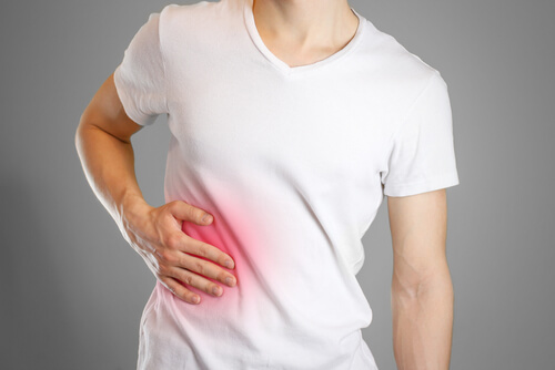 Man experiencing abdominal pain
