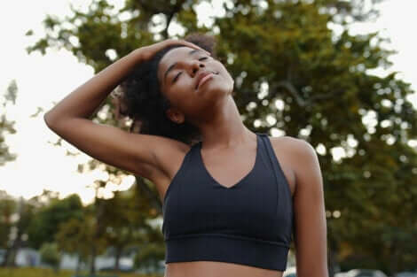 A woman stretching her neck.