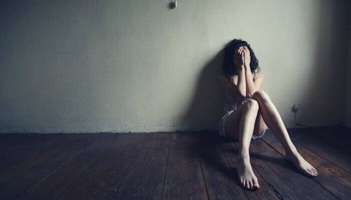 a woman very sad because of a breakup