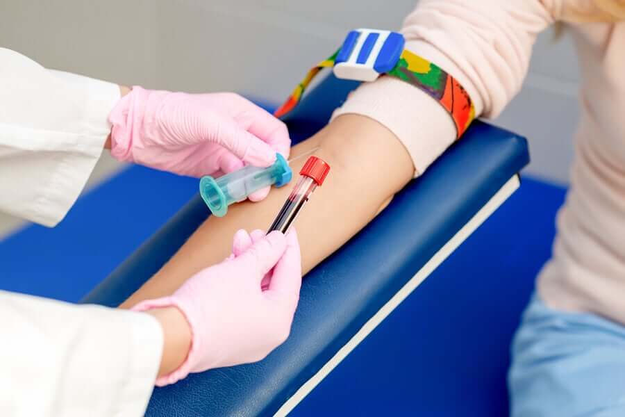 A woman getting a blood draw.