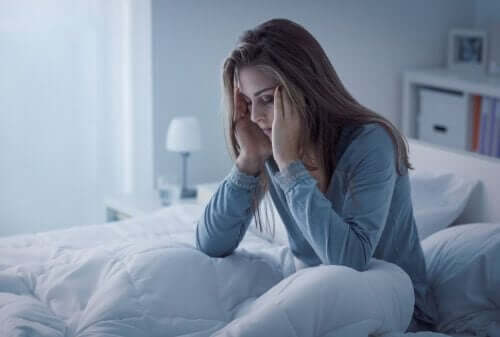 A woman with a migraine.