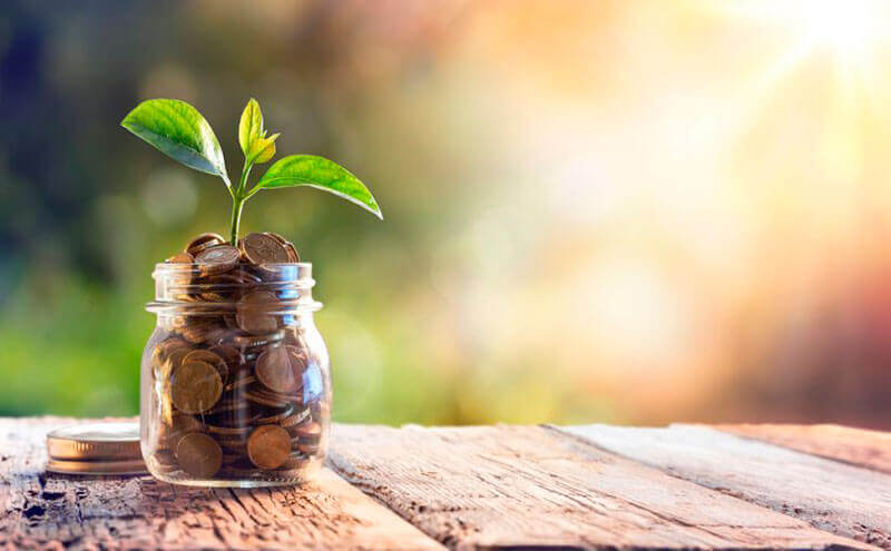 coins in a jar to save money