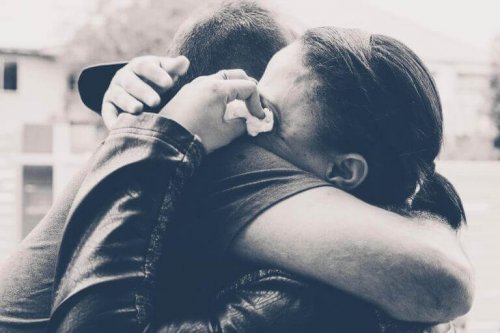 Black and white image hugging and crying
