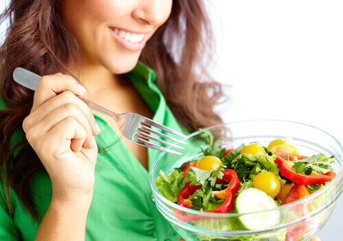 person eating a salad