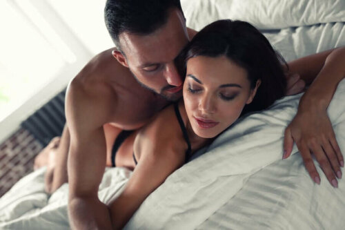 A man on top of a woman.