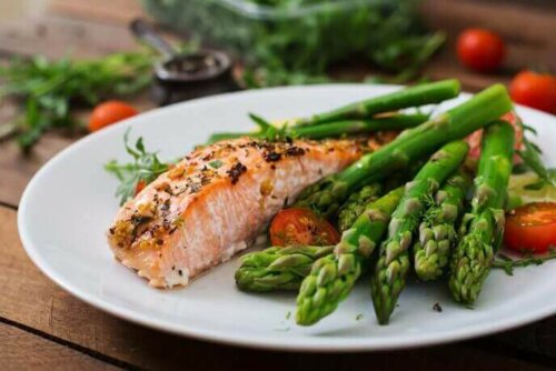 A plate of salmon and asparagus.