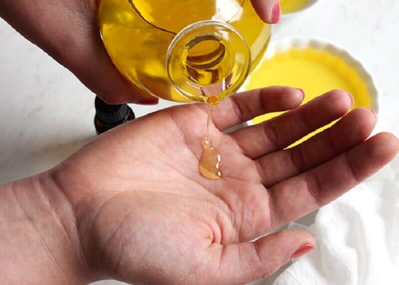 You can apply argan oil using your own hands.